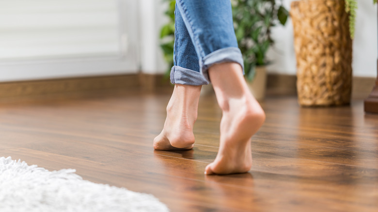 feet walking on hardwood floors