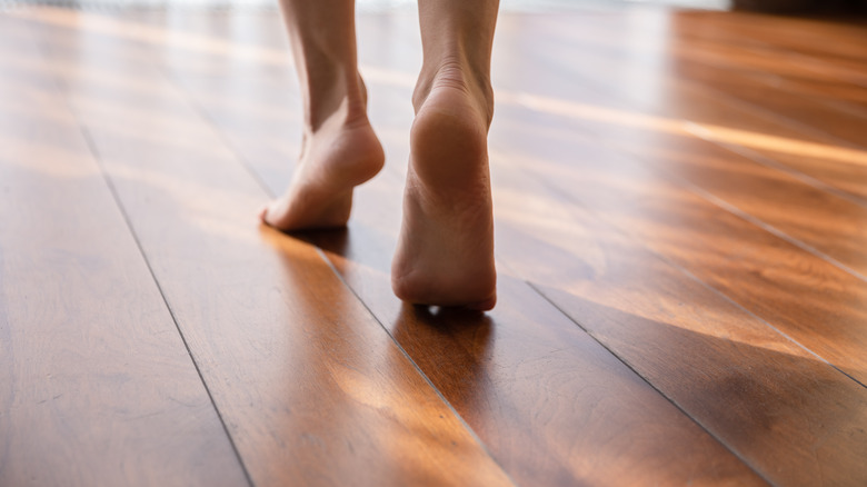 walking gently on wooden floor