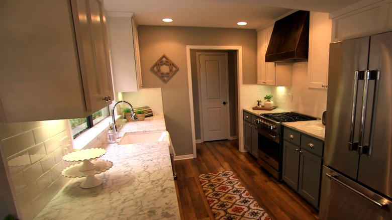 kitchen with dark bottom cabinets