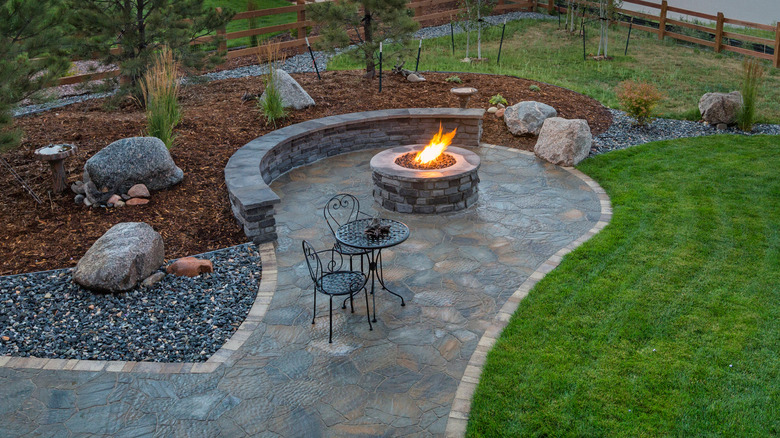 Fire pit surrounded by flagstone