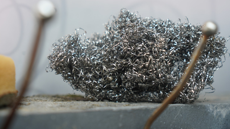 Steel wool on the side of the sink