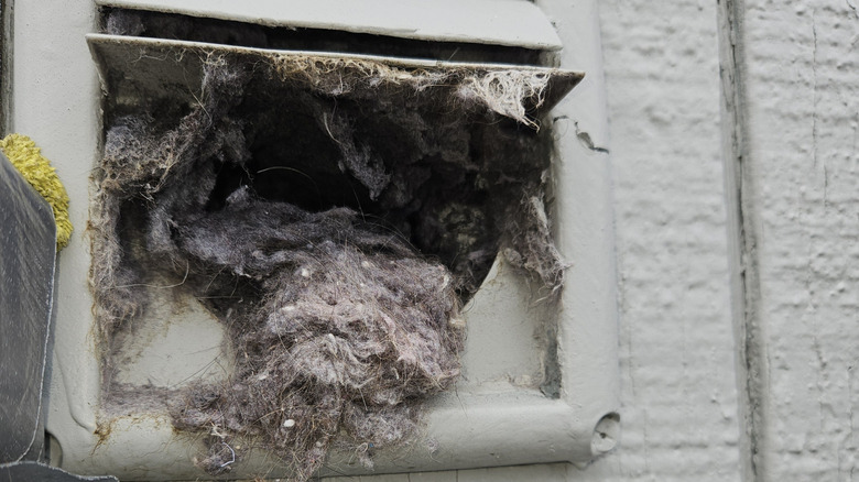Extreme lint buildup inside residential dryer vent duc