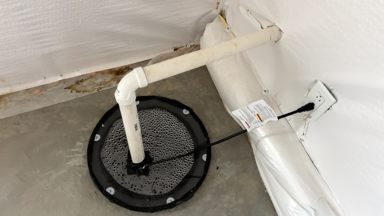 A sump pump is installed in a basement