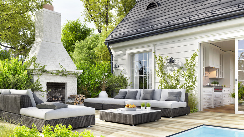 living room and outdoor patio sharing the same flooring