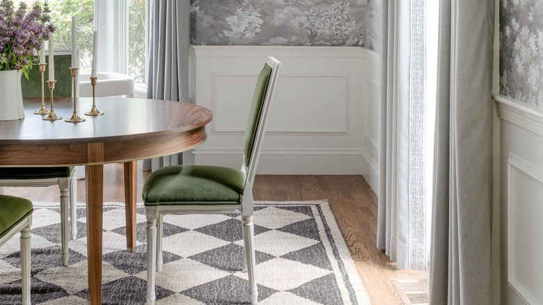 black and white diamond print rug in dining room