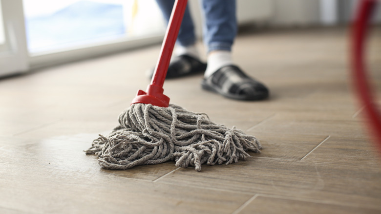 Closeup of a mop on tiled floors