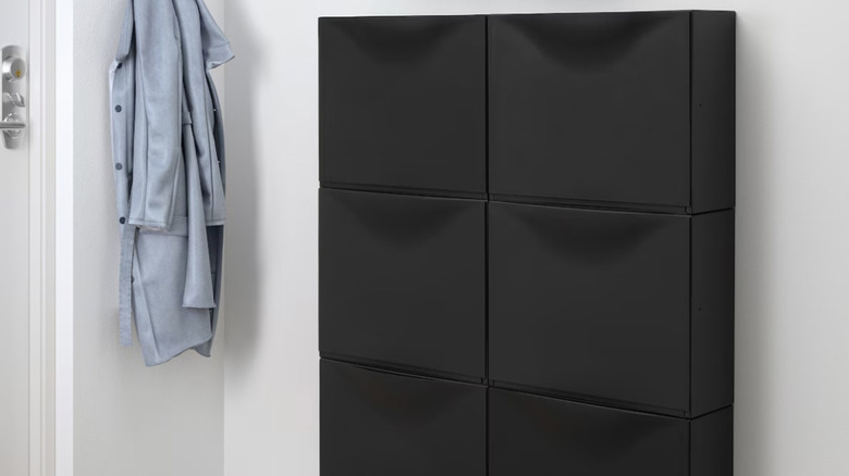 IKEA TRONES Black cabinet on wall