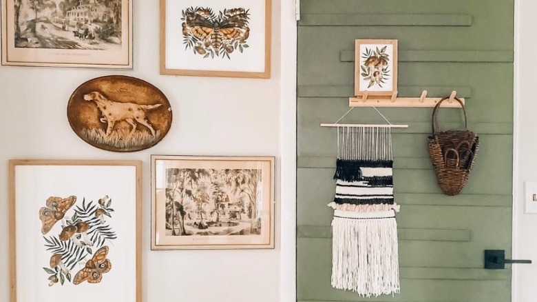 A sage green door with horizontal textured accents