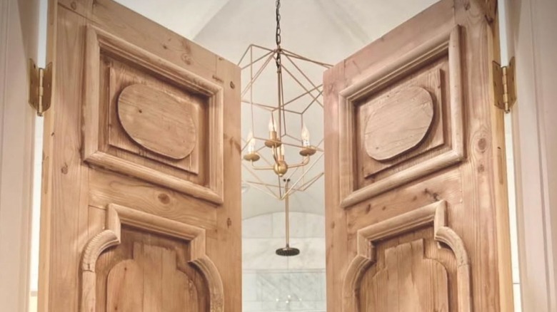 Two stripped antique doors in a light toned wood