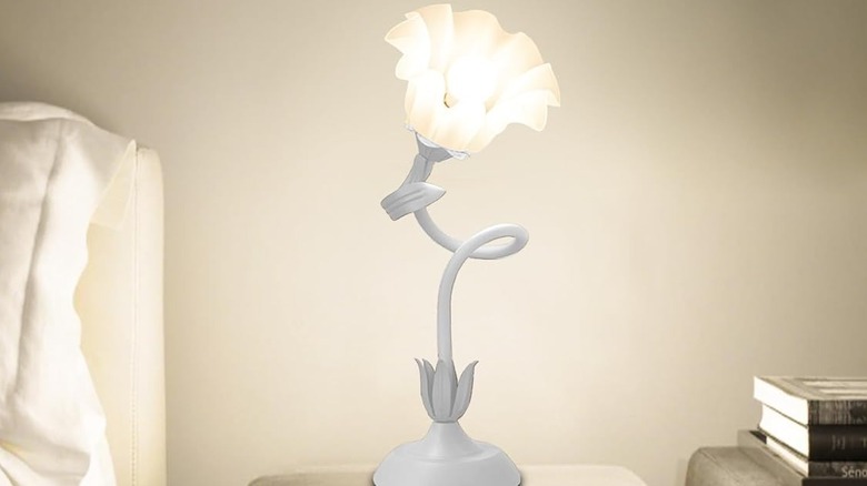 The AQDZCNF Flower Table Lamp next to a bed
