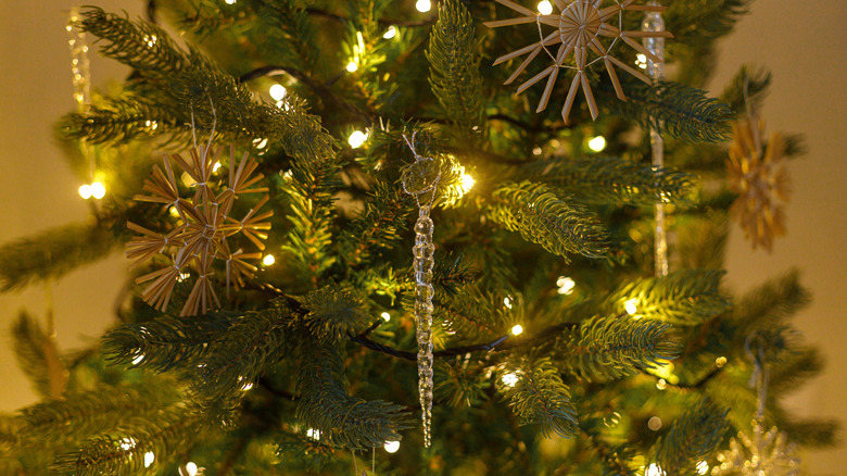 Sophisticated Christmas tree with vintage glass icicle ornaments and handmade ornaments