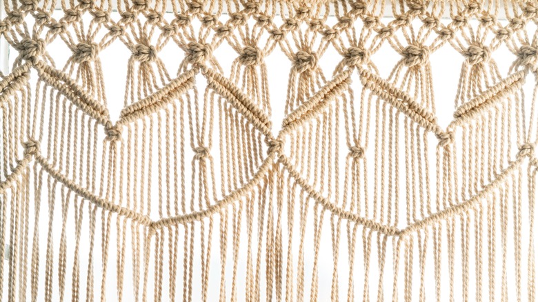 Close-up of an intricate macramé curtain
