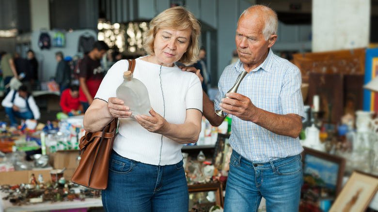 Mature couple shopping at antique shop
