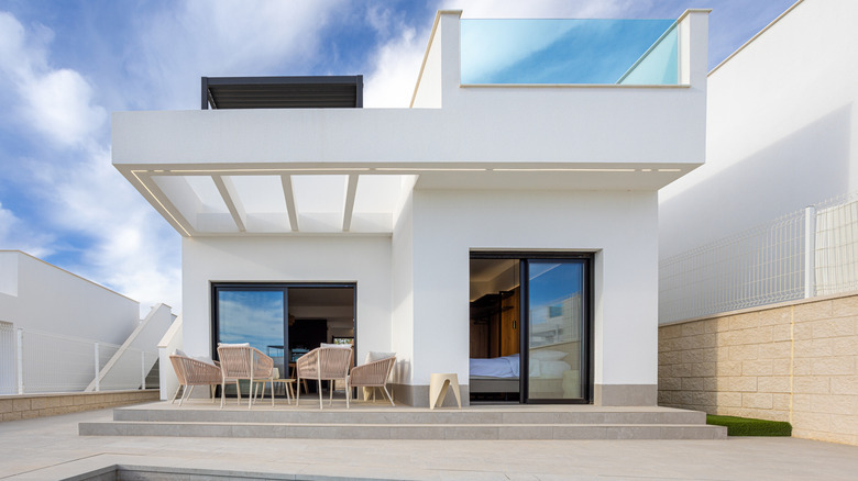A modern home and patio made primarily with concrete
