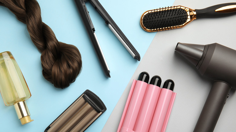 Messy counter full of hair tools