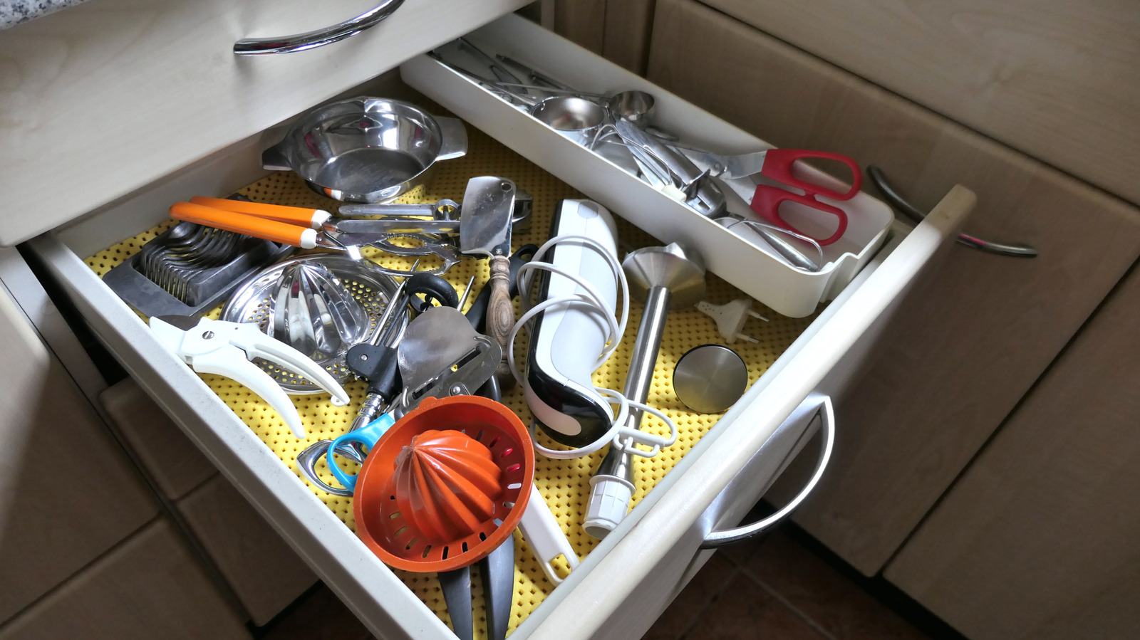 Free Up Kitchen Drawer Space With A Creative Utensil Holder Solution