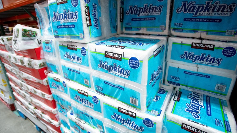 Stacks of Kirkland Signature napkins in the a Costco Warehouse