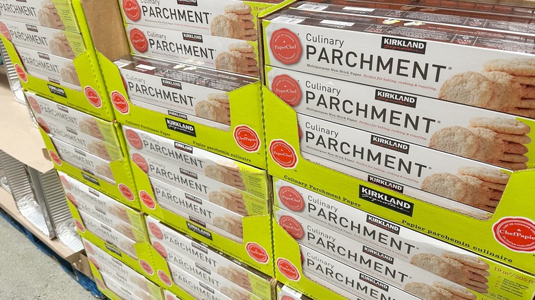 Packages of Kirkland Signature parchment paper stacked in store