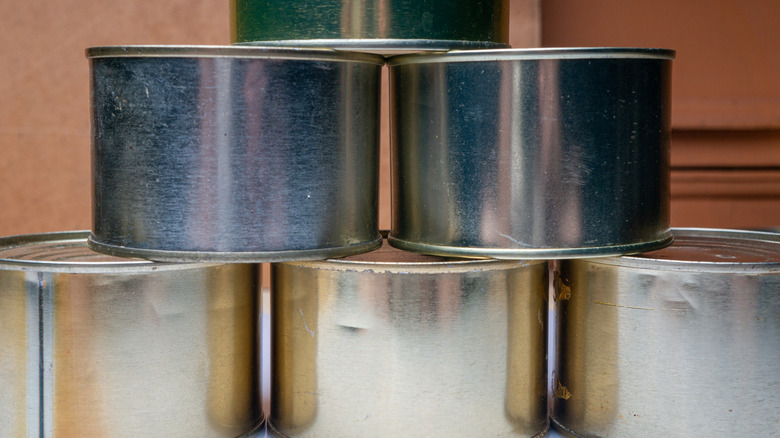 A stack of empty tuna cans ready for reuse
