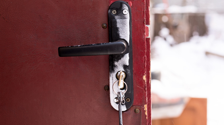frozen door with key in lock