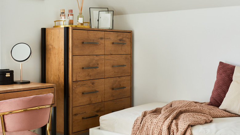 Narrow drawer storage in a small bedroom