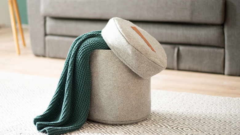 Cute round ottoman with top off