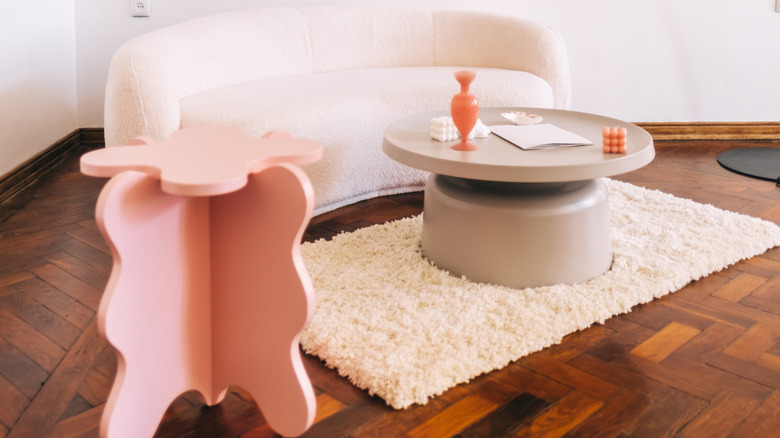 Interior of bright modern living room with sofa and coffee table