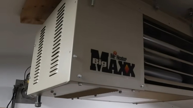 Vented natural gas heater installed in a garage