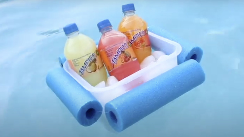 Drinks floating in a pool cooler