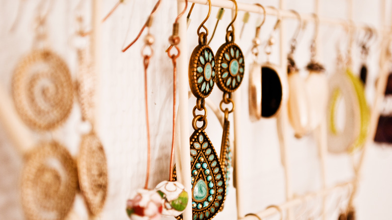 Hanging earrings on bars
