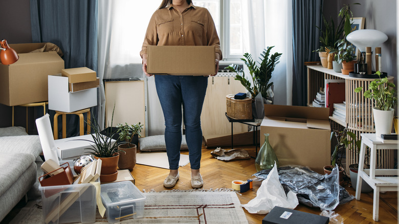 Woman in messy room