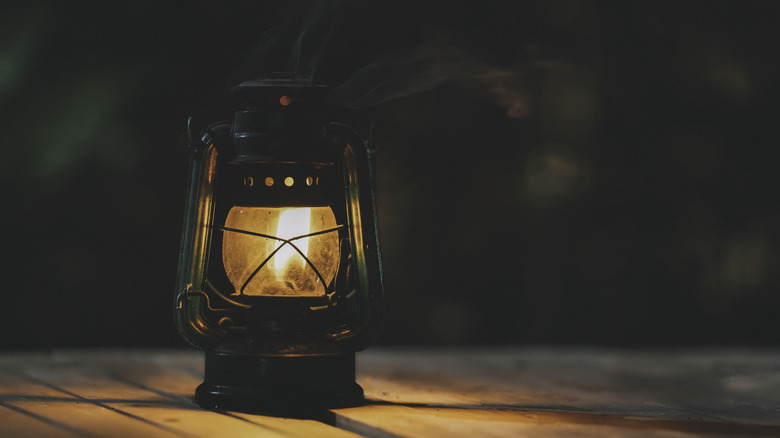lit kerosene lamp 