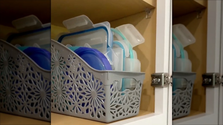 plastic lids in gray book bin