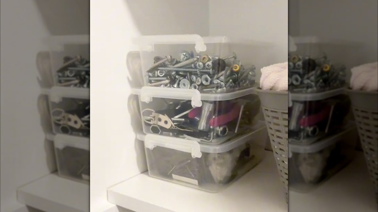 tools in clear plastic bins