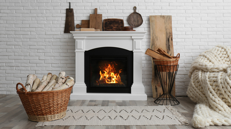 Fireplace with white brick wall