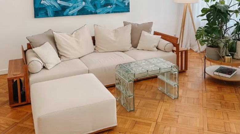 Coffee table constructed from glass bricks in a living room