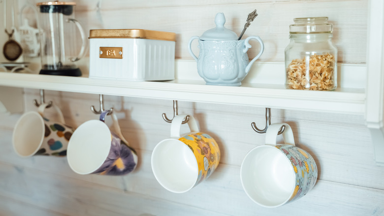 cups hanging in kitchen