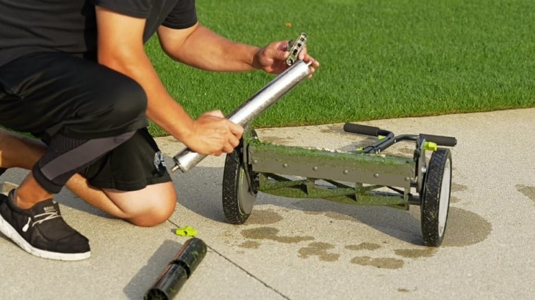 installing roller on reel mower