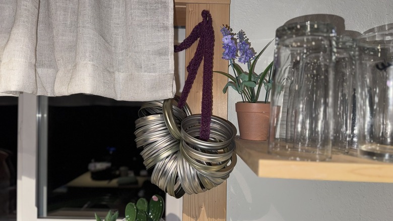 A crocheted strip used to hold canning jar rings