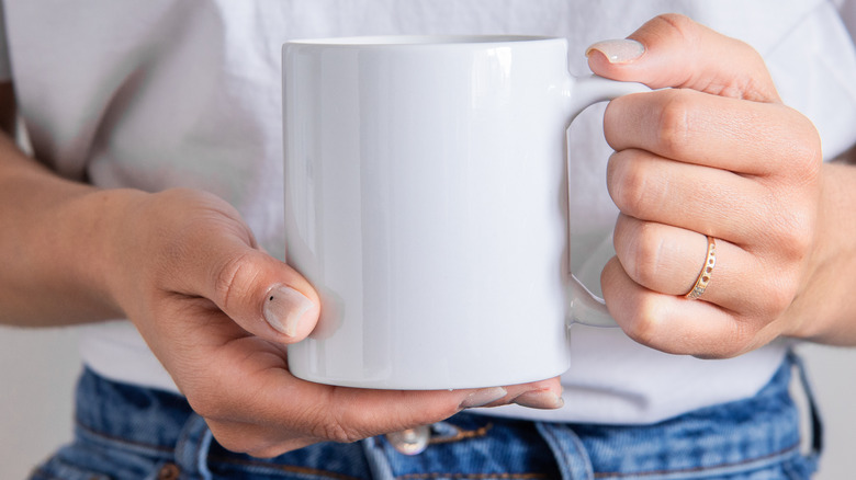 DIY Nail Polish Marbled Mugs | ehow.com | Nail polish crafts, Diy nail  polish, Diy gifts