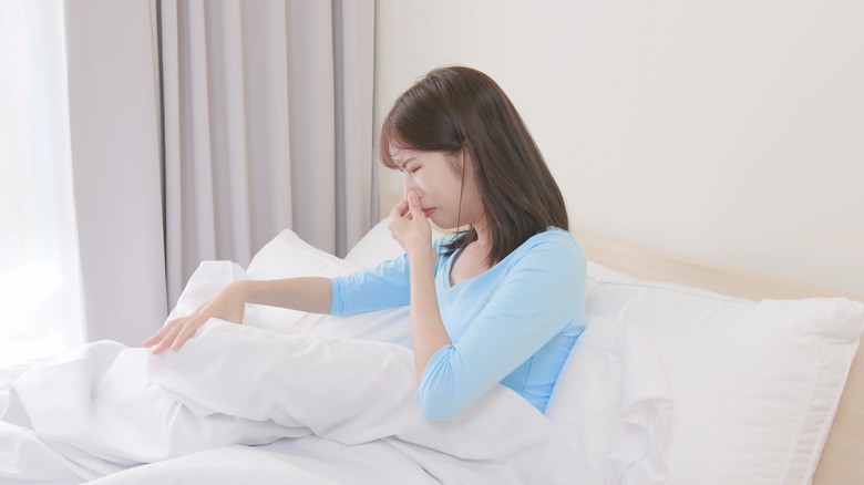 woman notices sheets smell bad