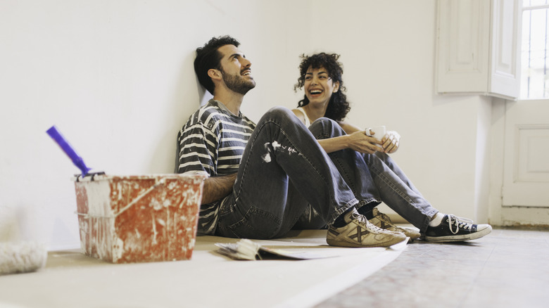 Couple sitting and laughing