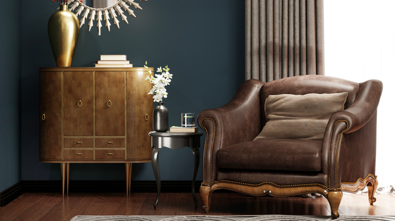 a traditional living room with artistic collected treasures