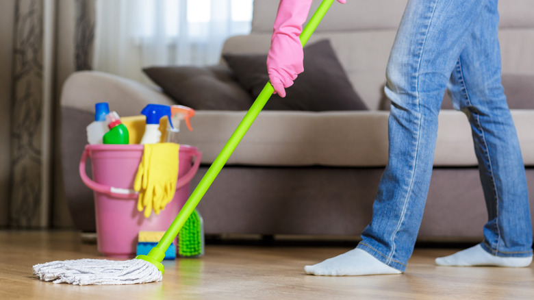 cleaning bucket, mop on vinyl floor