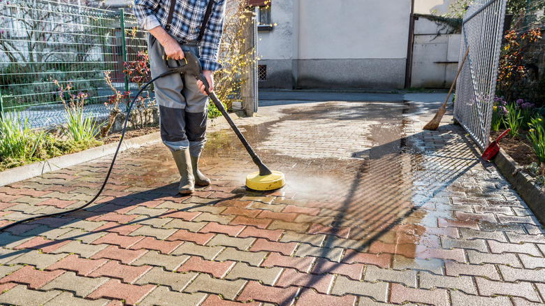 Get Your Driveway Sparkling Clean With A Cleaning Essential That Everyone Has