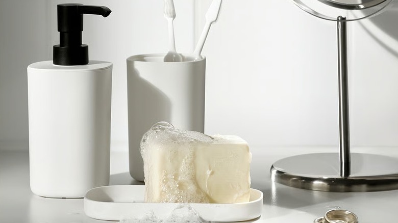 IKEA STORAVAN 3-piece bathroom soap set on a vanity