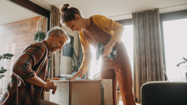 Family building furniture together