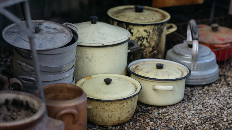 cast iron pots and pans hanging