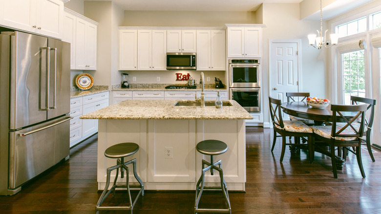 A modern kitchen with a white island