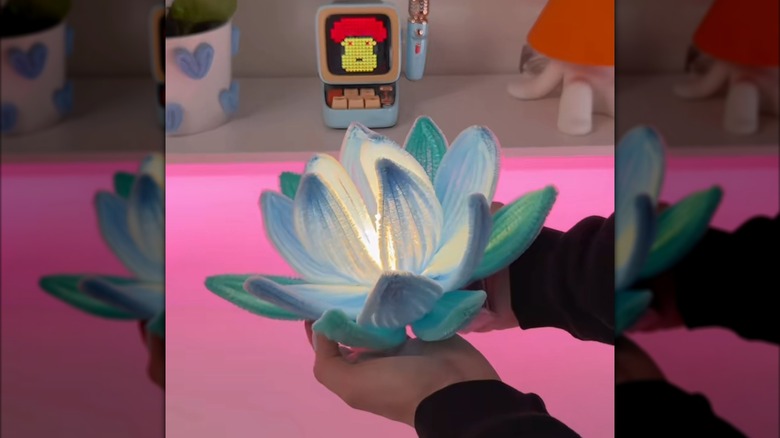 A lotus light made from pipe cleaners.